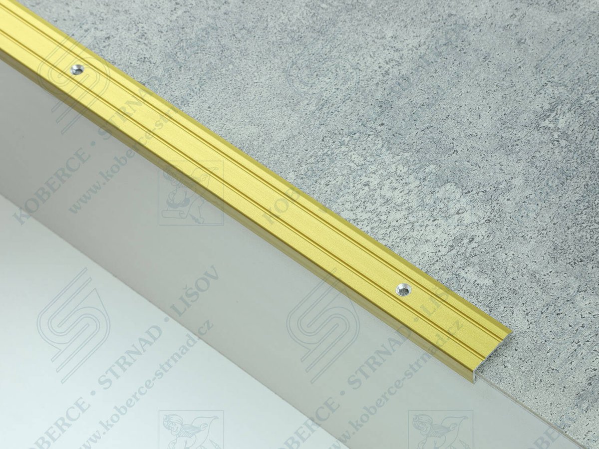 Schodová hrana 24,5x10 mm zlatá vrtaná