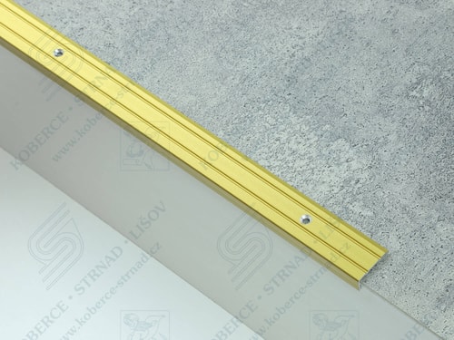Schodová hrana 24,5x10 mm zlatá vrtaná