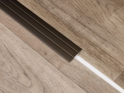 Plochá přechodová lišta 38 mm tmavý bronz Küberit